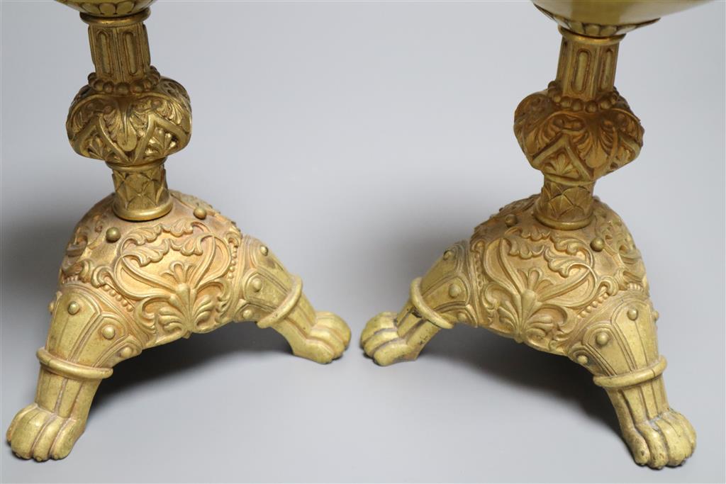 A pair of small 19th century ormolu candlesticks, 19cm